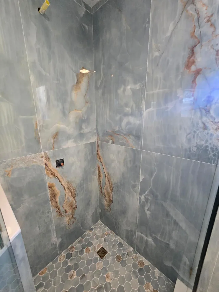 Opulent Teal Marble Shower Design by Level Up Construction & Investment Group LLC - Photo 2
