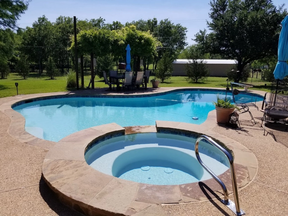 Ridge Pool Remodel & Cantilever Cover by Graves Landscape & Outdoor Living - Photo 2