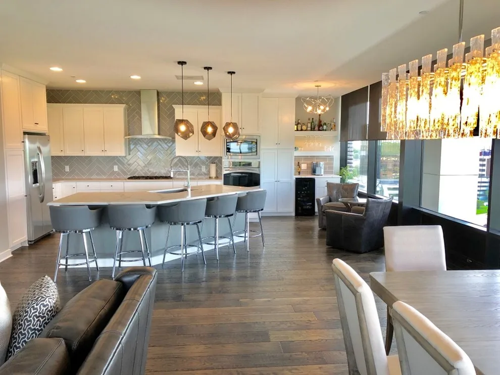 A luxurious high-rise condominium undergoes a significant renovation. by Surface To Surface Interior Design/Construction - Photo 5