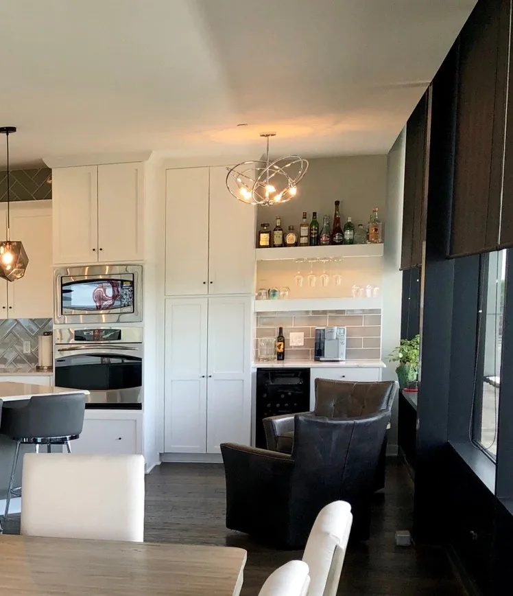 A luxurious high-rise condominium undergoes a significant renovation. by Surface To Surface Interior Design/Construction - Photo 12