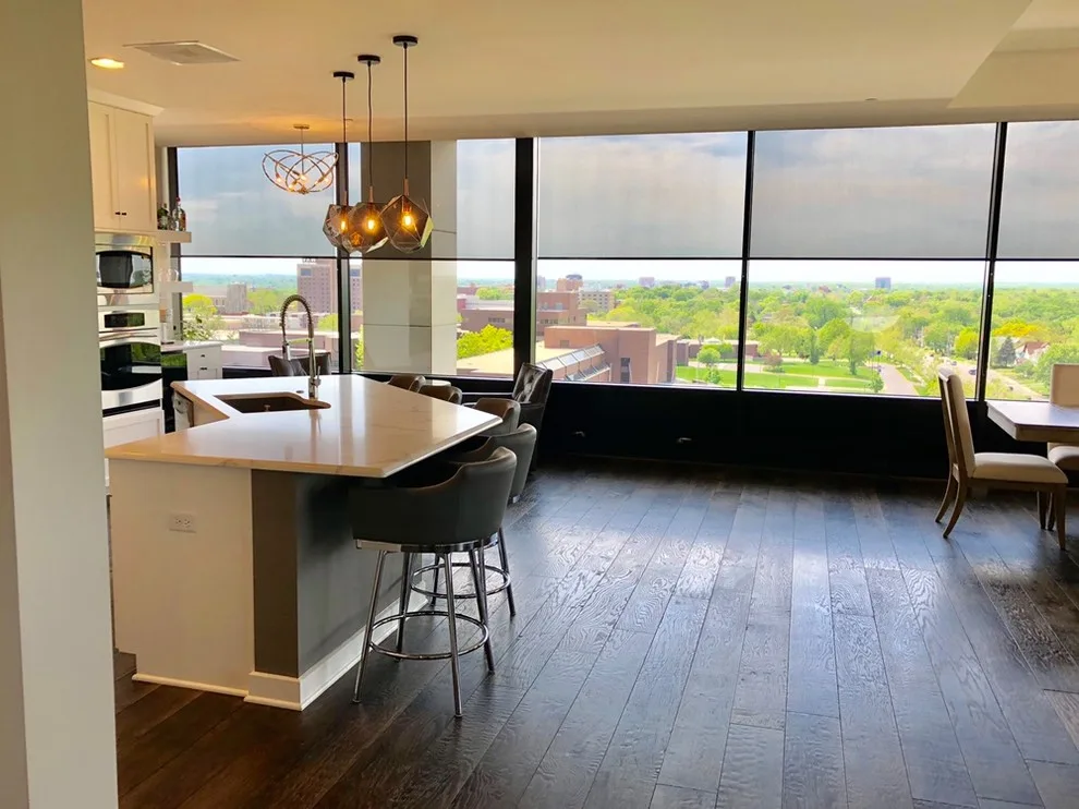 A luxurious high-rise condominium undergoes a significant renovation. by Surface To Surface Interior Design/Construction - Photo 4