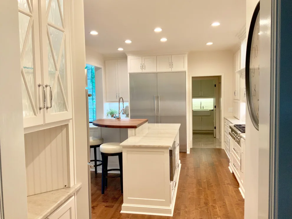 Essential kitchen renovation by Surface To Surface Interior Design/Construction - Photo 10