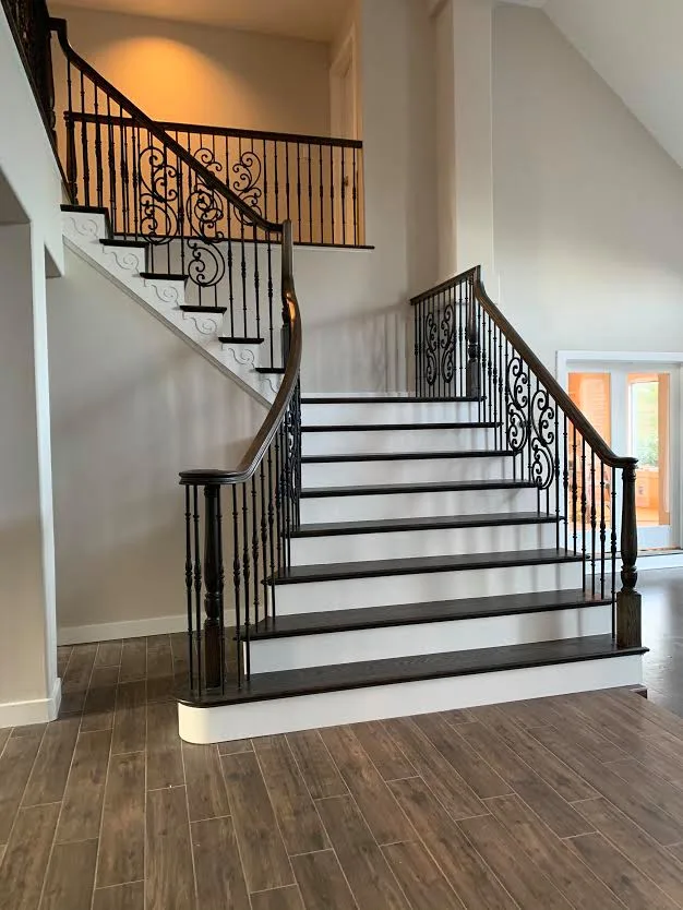 Bespoke Iron Staircase by Sherry Frederick Interior Designs & Co - Photo 3