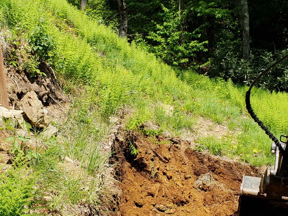 Landslide from Water & Soil Erosion Backyard Transformation by Greenscapes Landscaping & Retaining Walls - Photo 7