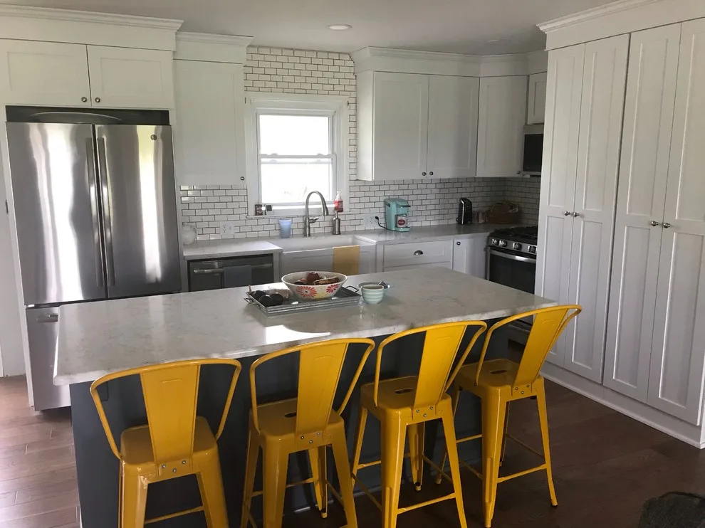 Renovated kitchen, dining area, and living space by HLC Interior Solutions - Photo 11