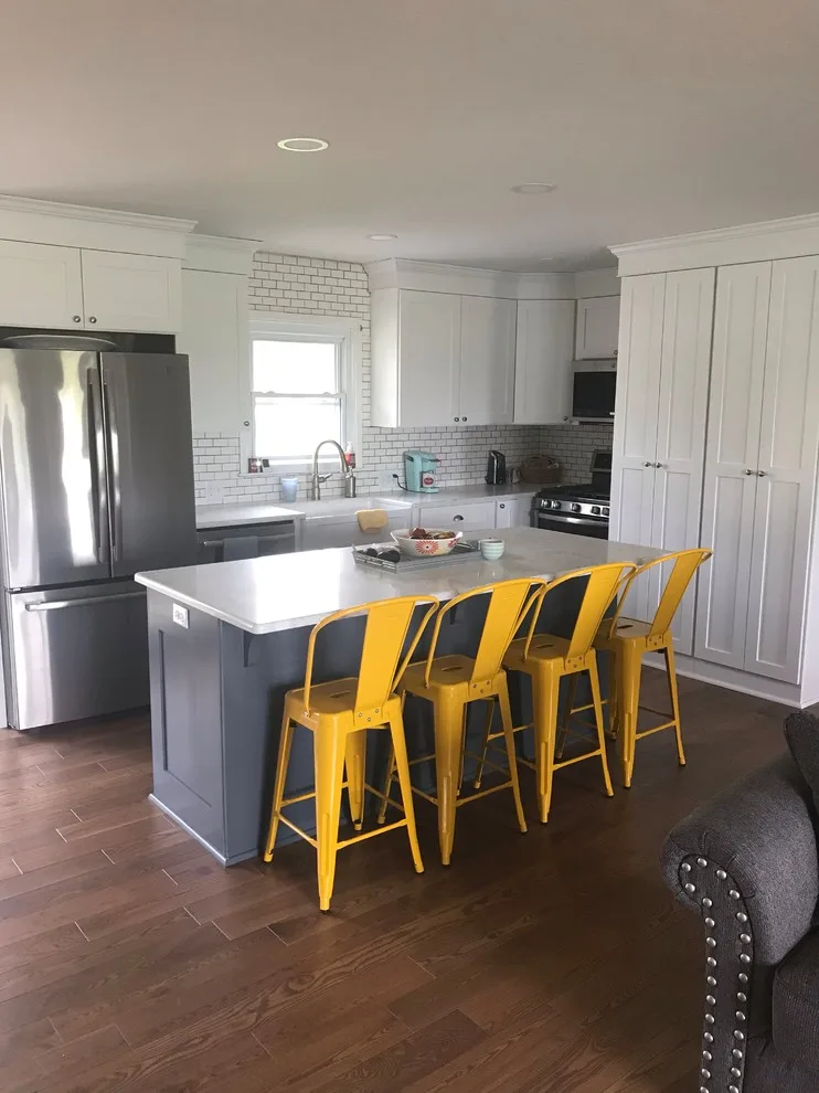 Renovated kitchen, dining area, and living space by HLC Interior Solutions - Photo 5
