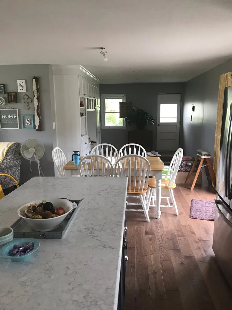 Renovated kitchen, dining area, and living space by HLC Interior Solutions - Photo 10