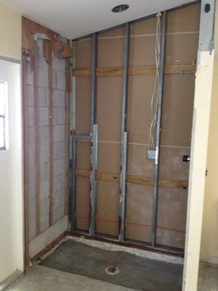 Jupiter, Florida Bathroom Remodel - Using Vertical Lines to Enhance a Compact Area by Southeast Interior Design, Inc. - Photo 3