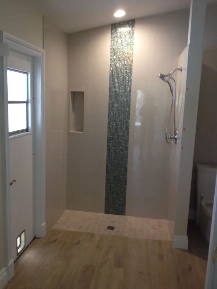 Jupiter, Florida Bathroom Remodel - Using Vertical Lines to Enhance a Compact Area by Southeast Interior Design, Inc. - Photo 6