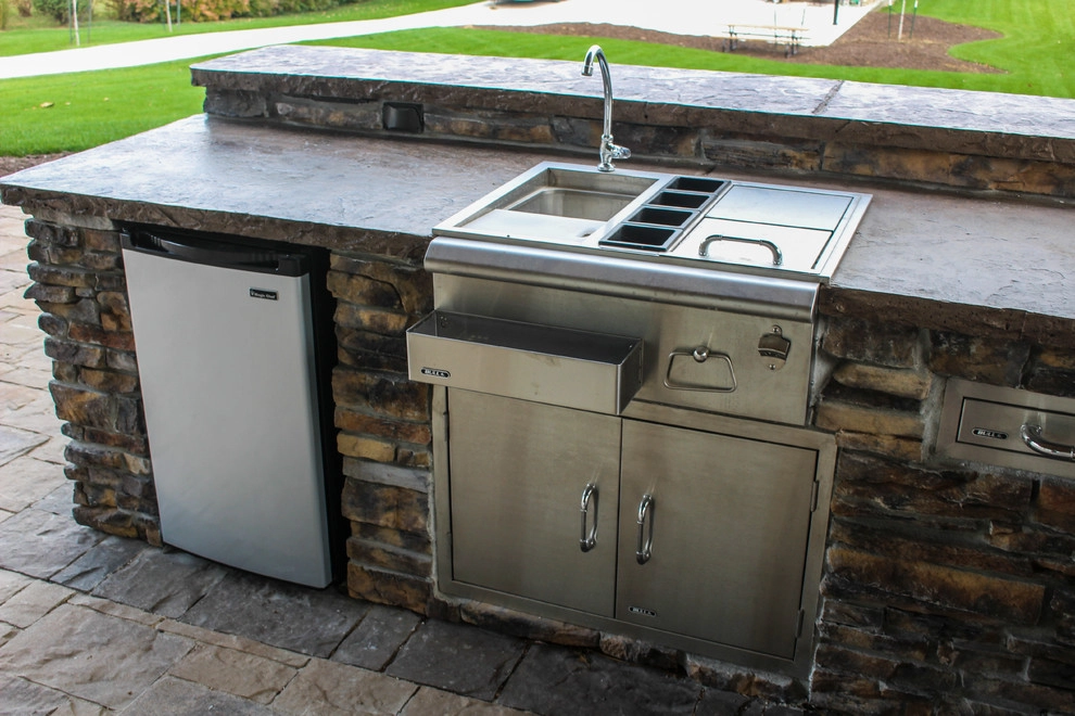 Picturesque Outdoor Kitchen and Patio by Groundscapes, Inc. - Photo 11