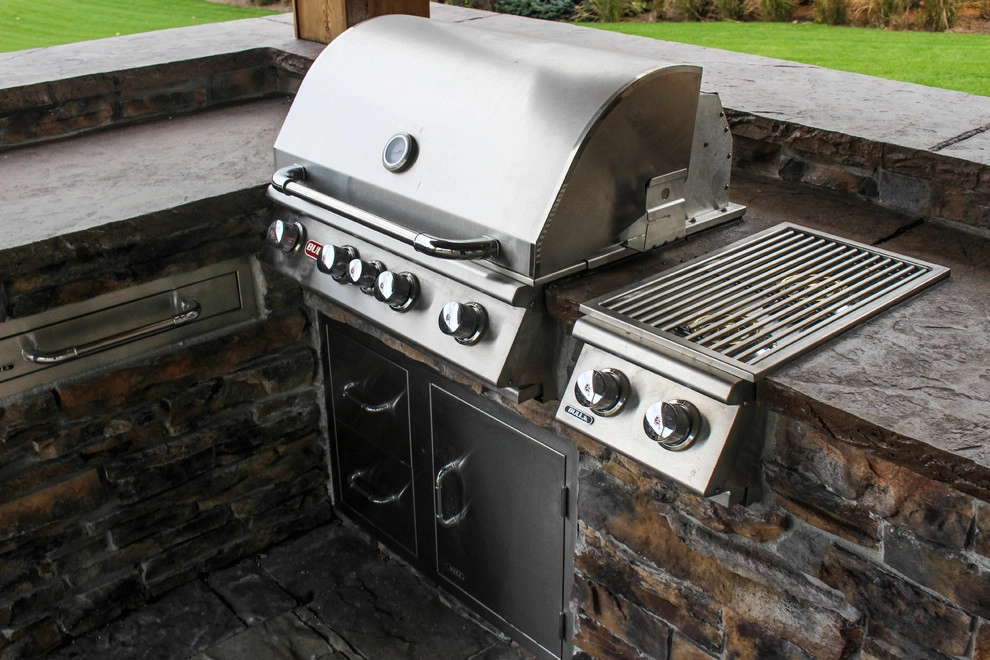 Picturesque Outdoor Kitchen and Patio by Groundscapes, Inc. - Photo 8