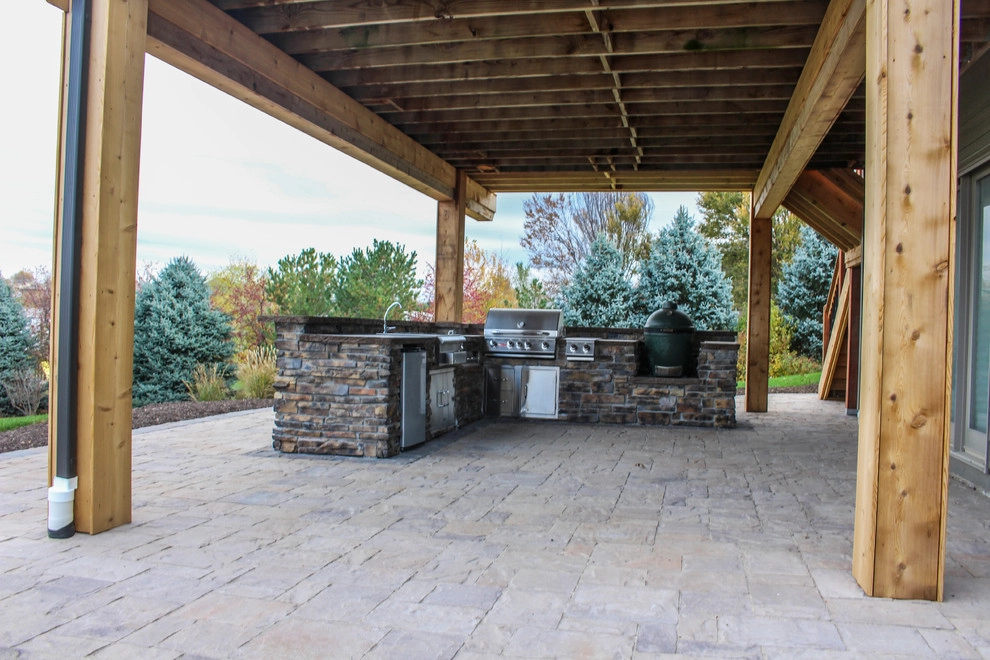 Picturesque Outdoor Kitchen and Patio by Groundscapes, Inc. - Photo 12
