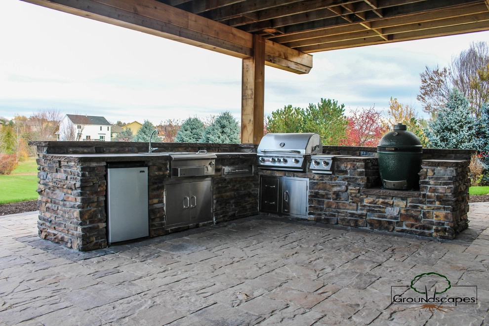 Picturesque Outdoor Kitchen and Patio by Groundscapes, Inc. - Photo 6