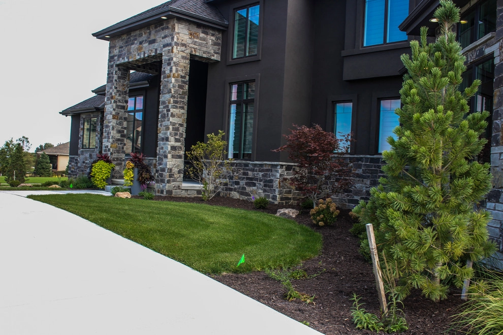 Towering Home Landscape With Perfect Lawn by Groundscapes, Inc. - Photo 28