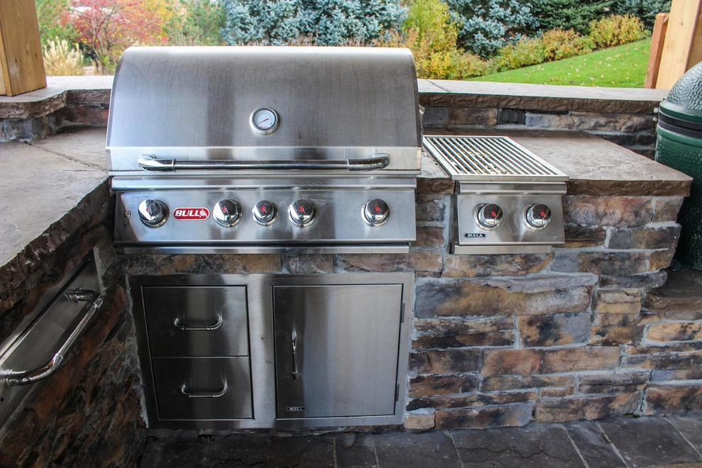 Picturesque Outdoor Kitchen and Patio by Groundscapes, Inc. - Photo 17