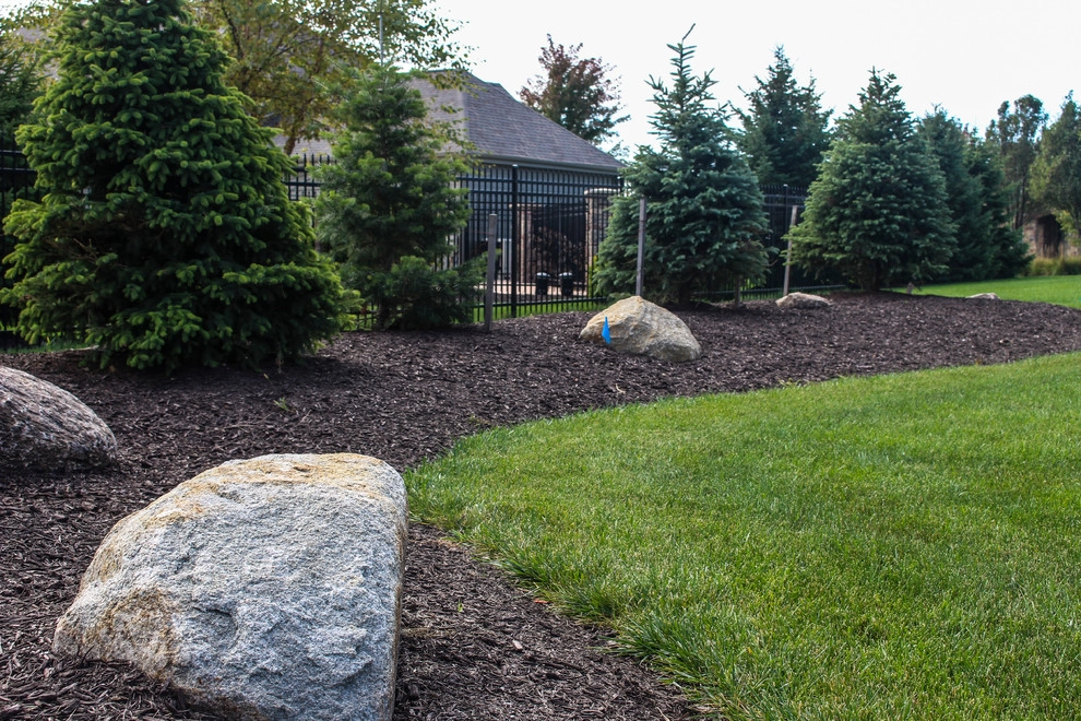Towering Home Landscape With Perfect Lawn by Groundscapes, Inc. - Photo 8