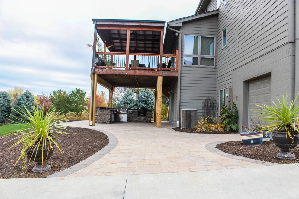 Picturesque Outdoor Kitchen and Patio by Groundscapes, Inc. - Photo 3