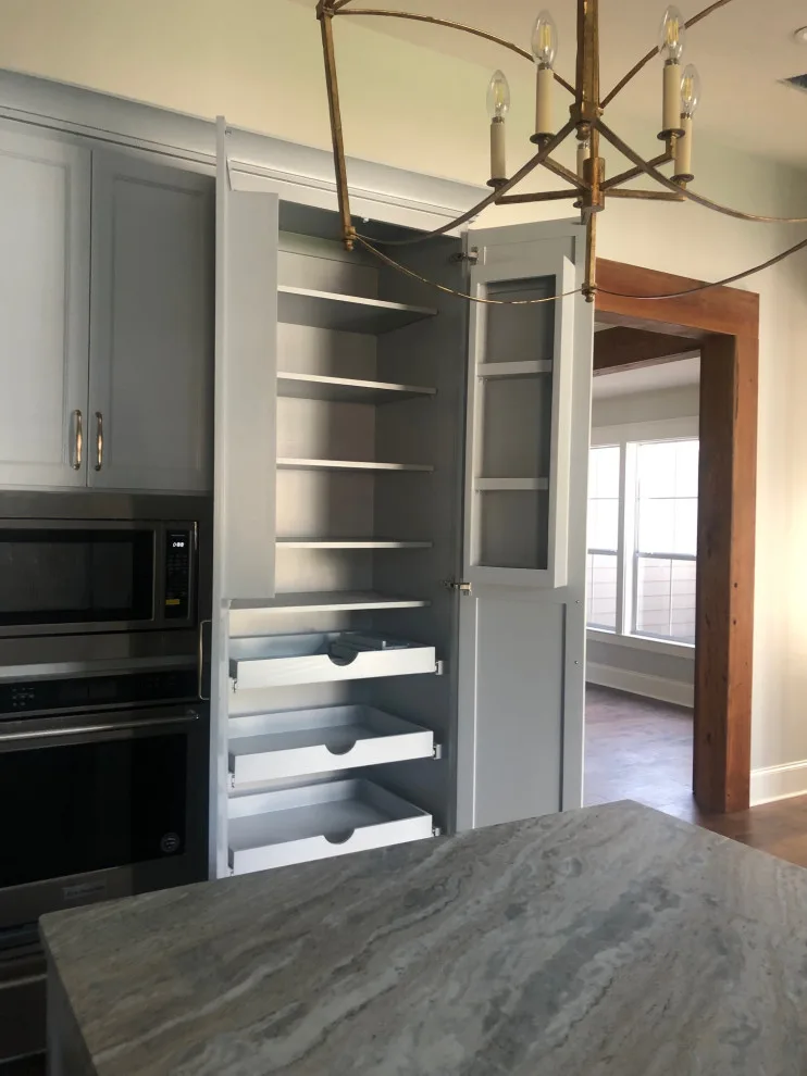 Remarkable Kitchen Featuring Tailored Storage Solutions by Interior Design Group - Photo 12