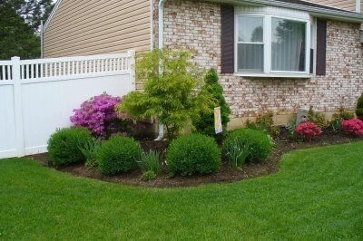 Flower bed and rock garden by H&S Professional Lawncare And Property Maintenance - Photo 3