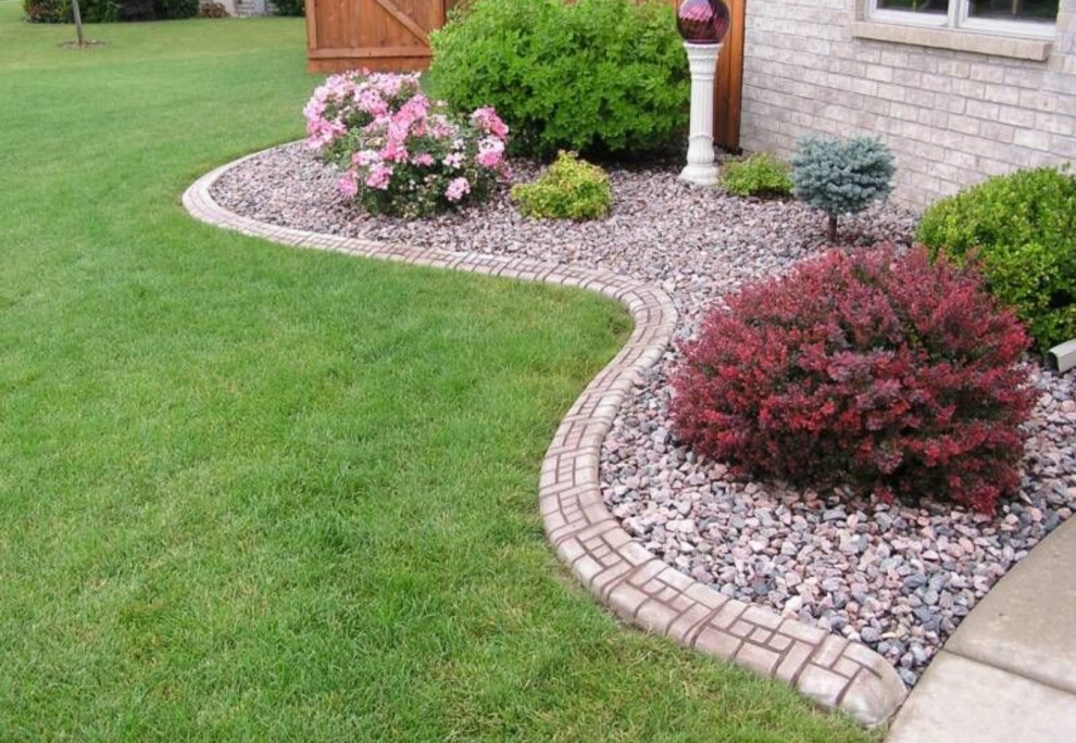 Rock flower bed by H&S Professional Lawncare And Property Maintenance - Photo 4