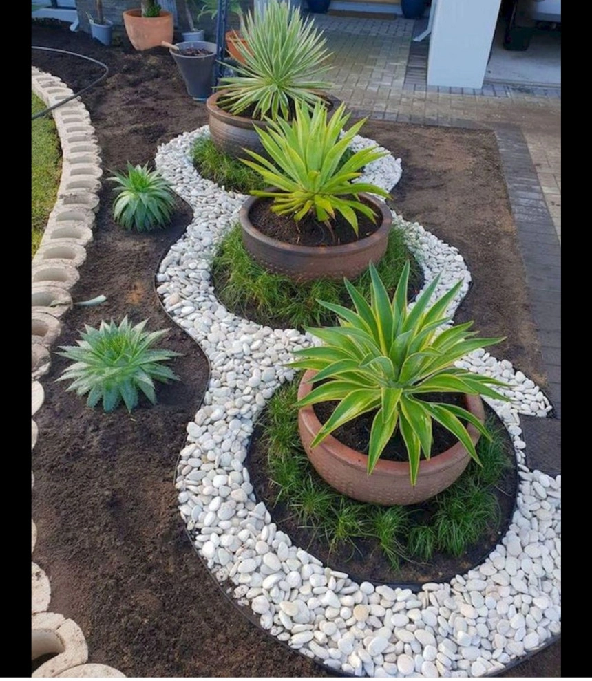 Rock flower bed by H&S Professional Lawncare And Property Maintenance - Photo 5