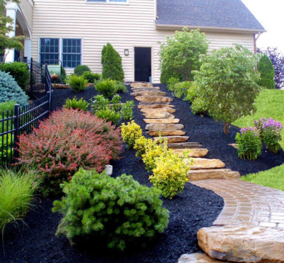 Rebuilding and mulching flower bed by H&S Professional Lawncare And Property Maintenance - Photo 4