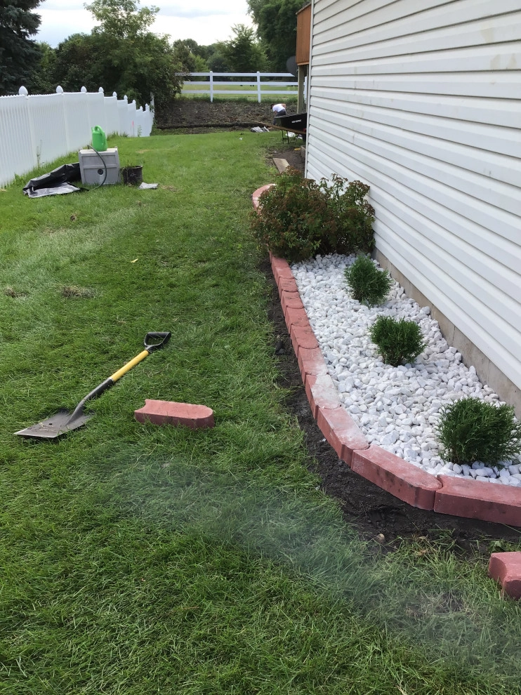 Flower bed and rock garden by H&S Professional Lawncare And Property Maintenance - Photo 11