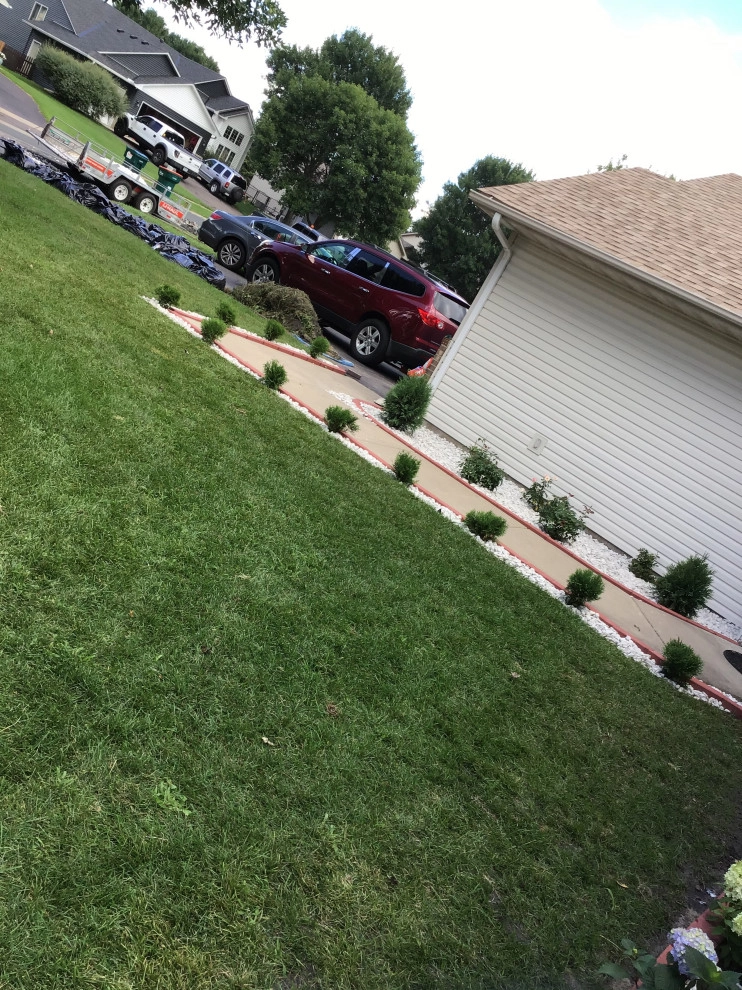 Flower bed and rock garden by H&S Professional Lawncare And Property Maintenance - Photo 10
