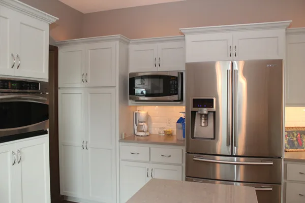 Willowbend Single-Hued Transitional Kitchen by Megan McGraw Interior Design - Photo 8