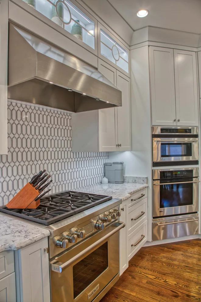 2019: An Enchanting White Kitchen with a Spacious Island by Lisa Lynn Designs Home Store & Design Studio - Photo 11