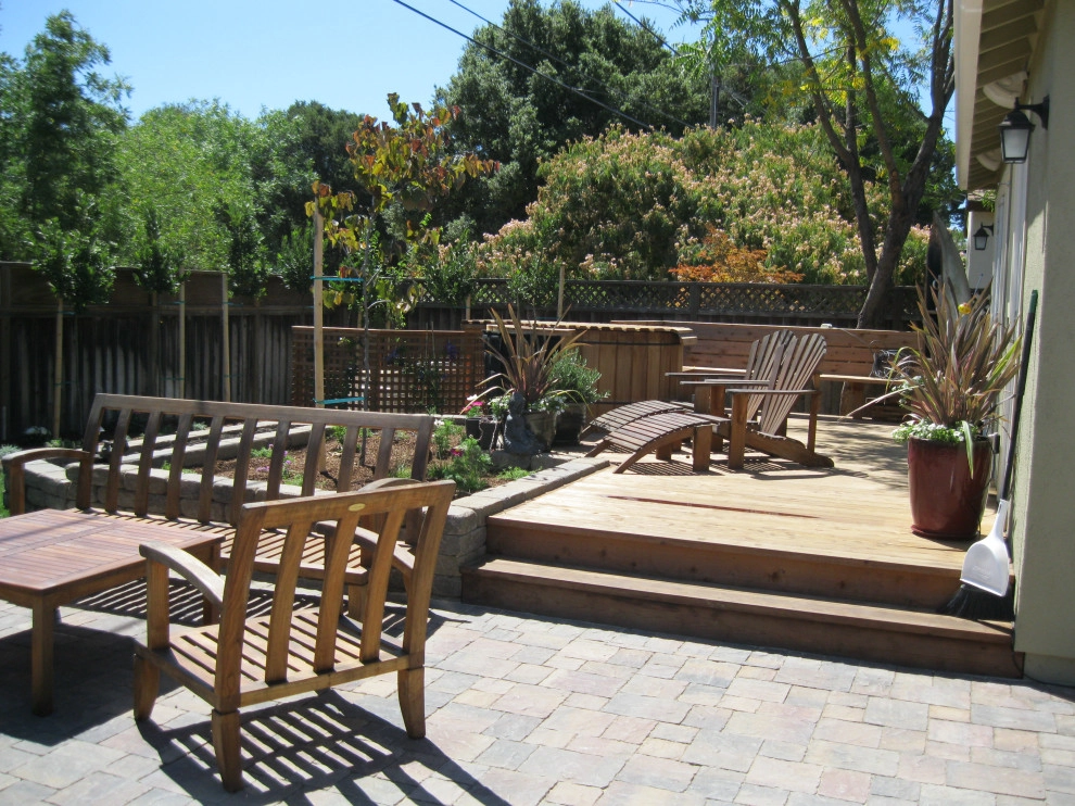 Inviting Garden with Fence, Paved Patio, & Raised Beds by Hortus Design Sustainable Landscapes - Photo 3