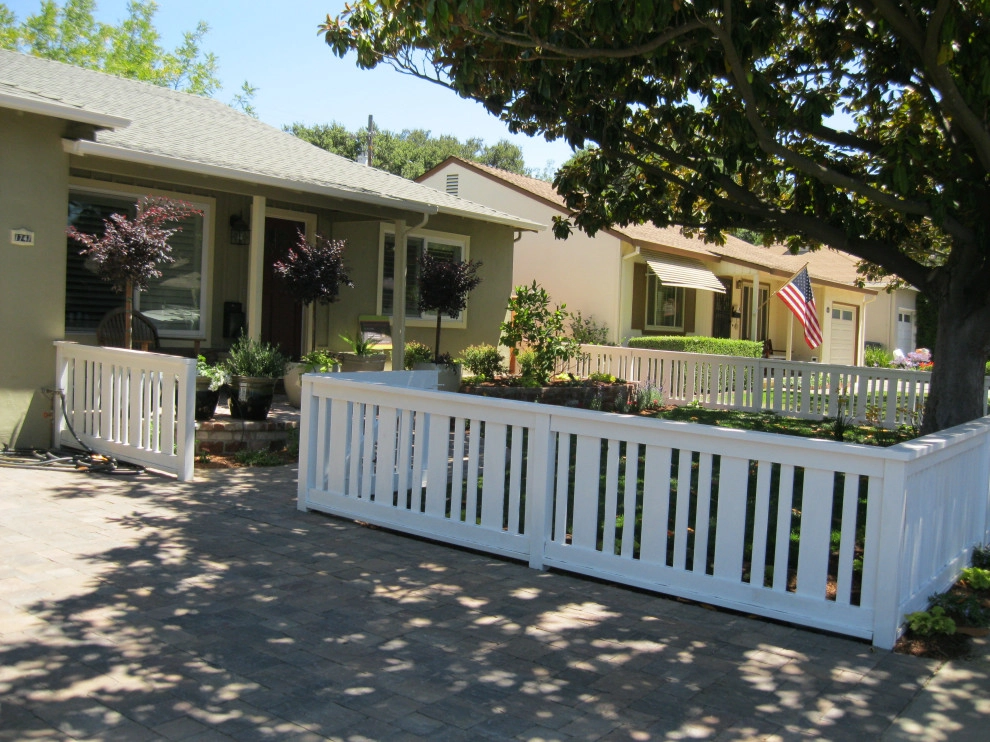 Inviting Garden with Fence, Paved Patio, & Raised Beds by Hortus Design Sustainable Landscapes - Photo 4