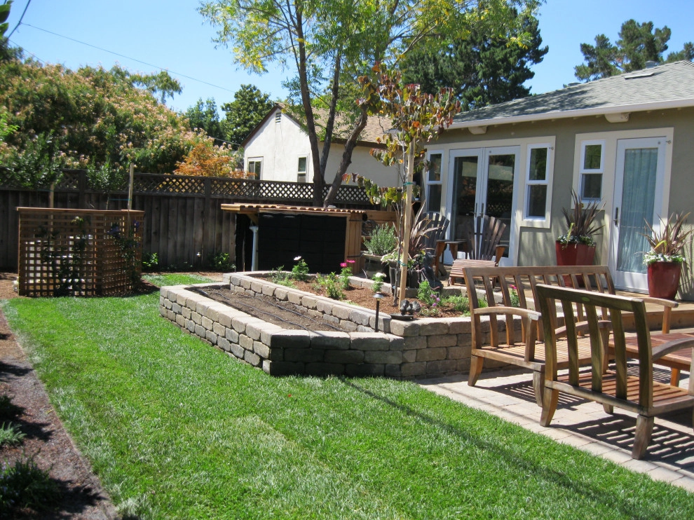 Inviting Garden with Fence, Paved Patio, & Raised Beds by Hortus Design Sustainable Landscapes - Photo 2