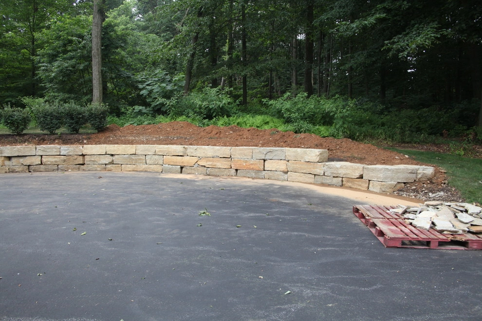 Boulder retaining wall by Indian Run Landscaping II, LLC - Photo 5