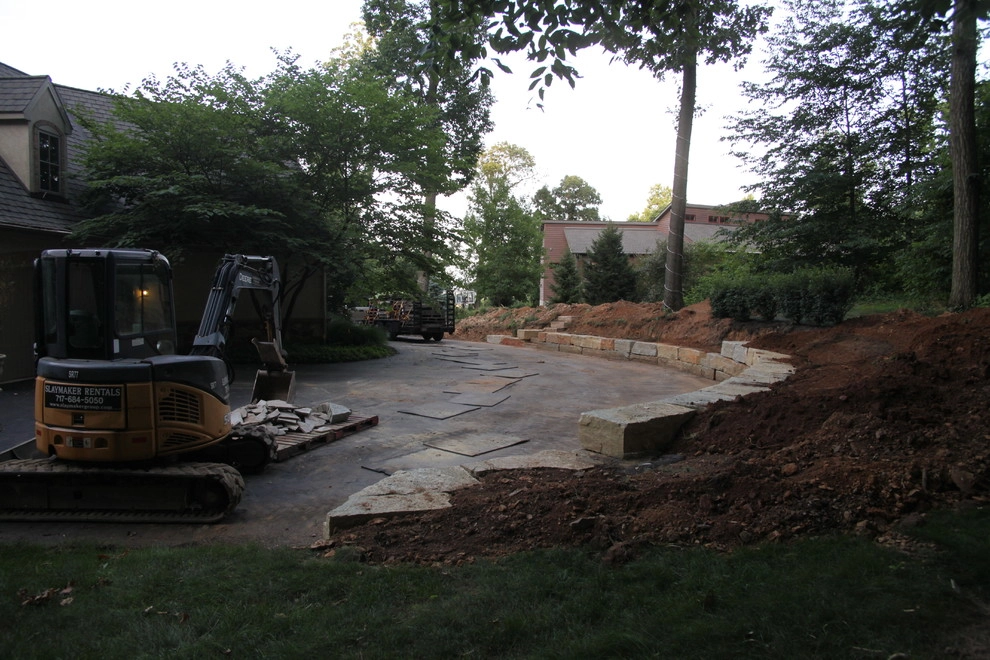 Boulder retaining wall by Indian Run Landscaping II, LLC - Photo 2