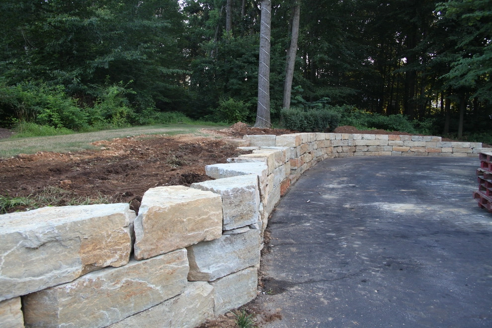 Boulder retaining wall by Indian Run Landscaping II, LLC - Photo 6