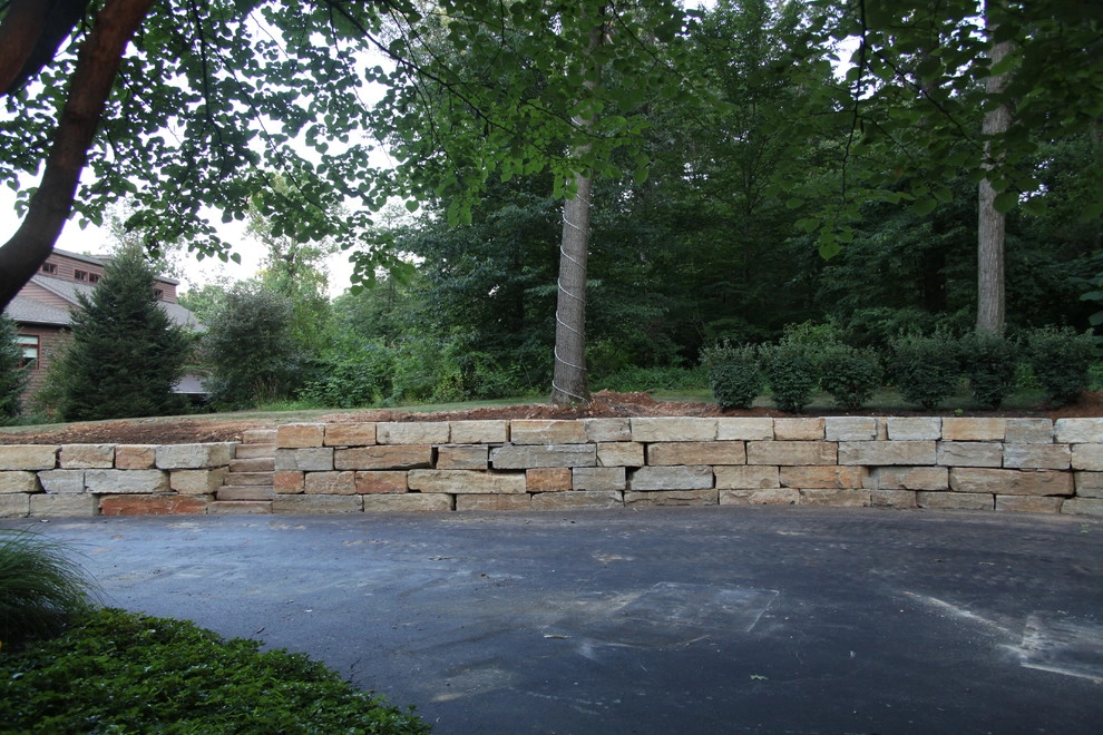Boulder retaining wall by Indian Run Landscaping II, LLC - Photo 4