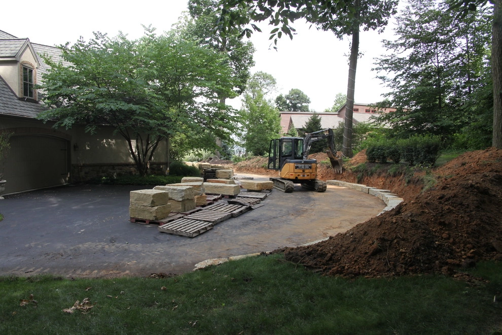 Boulder retaining wall by Indian Run Landscaping II, LLC - Photo 3