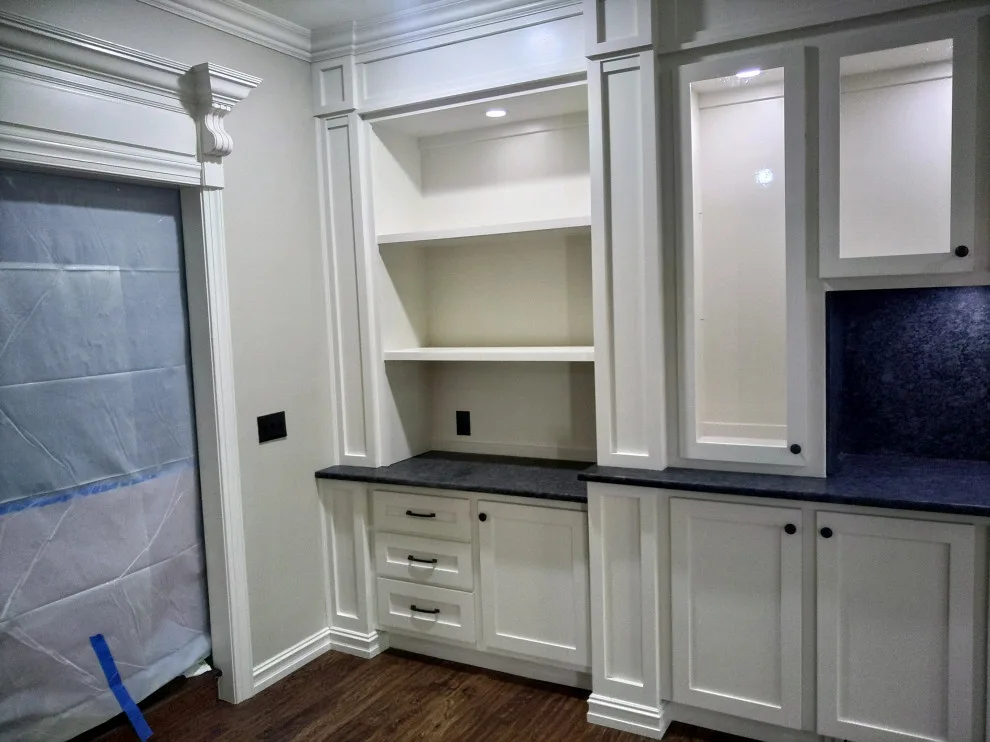 Lounge Area Showcase and Storage by Bartek Construction Inc. - Photo 3