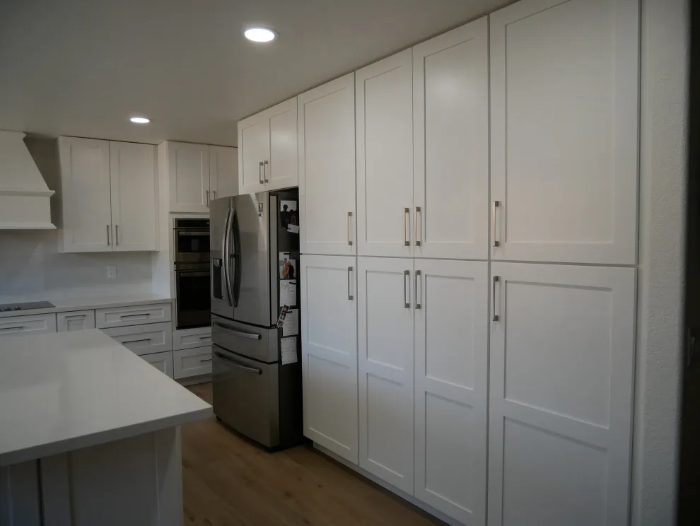 Efficient and Stylish Kitchen Renovation with Full-Length Storage Solutions by Alpha Remodelers - Photo 6