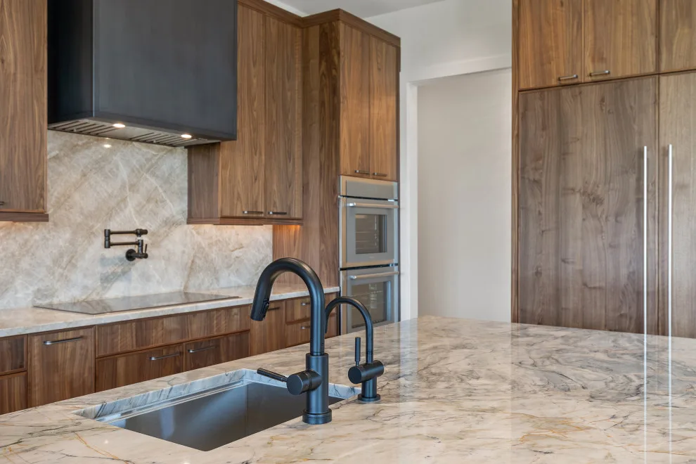 Wall-to-wall Walnut Slab by Signature Design & Cabinetry LLC - Photo 14