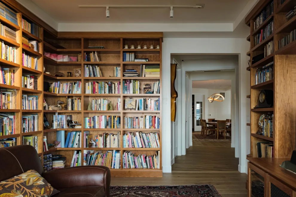 Custom Bookshelf and Fireplace Installations by Signature Design & Cabinetry LLC - Photo 3