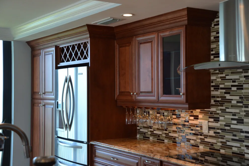Tailored Dark Wood Cabinet Renovation by Cornerstone Builders Of SWFL - Photo 3