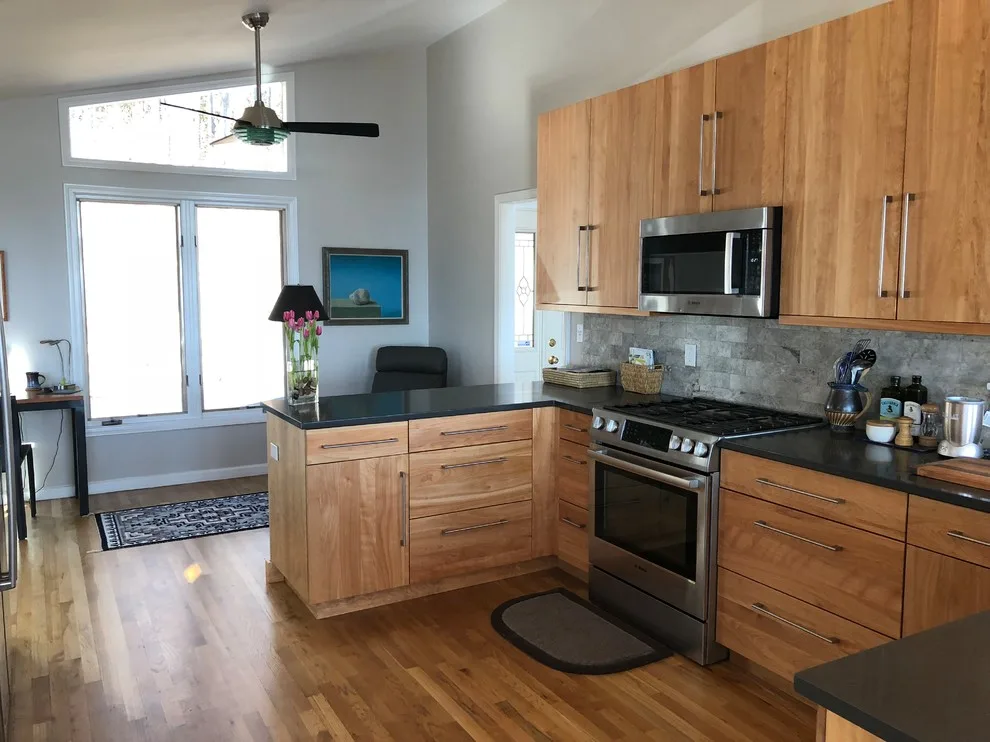 Red Birch Stainless Steel Kitchen by The Cabinet Design Studio At Forest Millwork - Photo 9