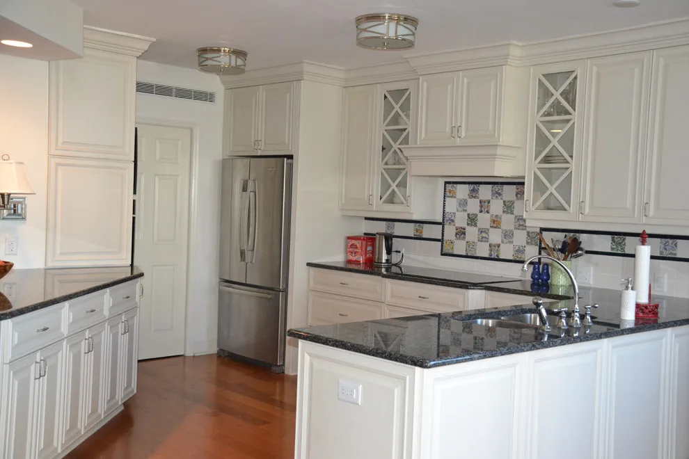 Light Cabinets and Stone Surfaces by Cornerstone Builders Of SWFL - Photo 2