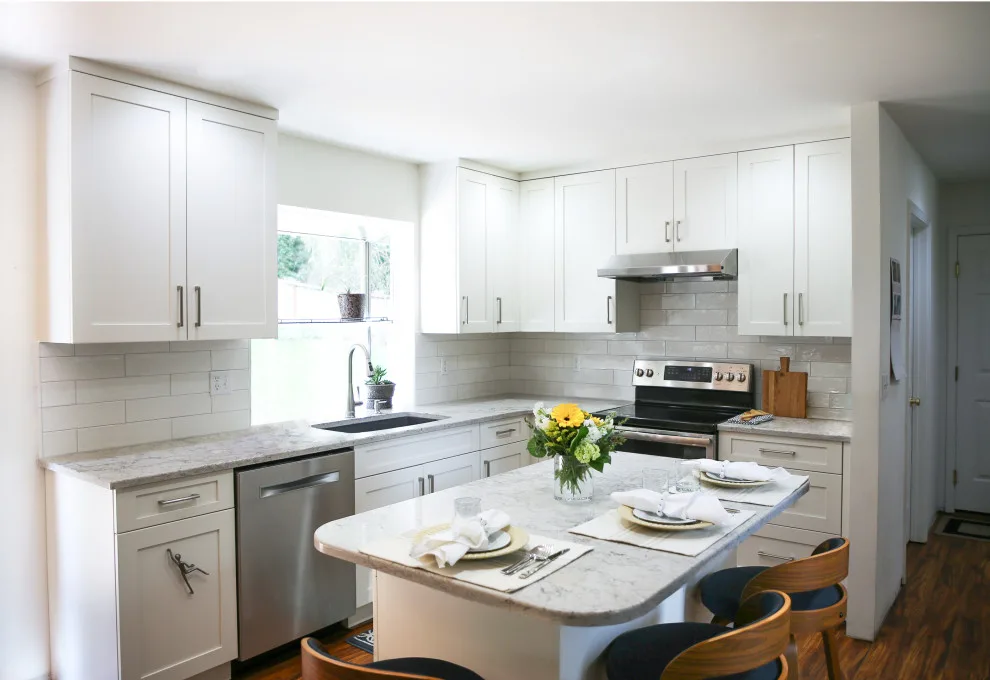 Light-colored Shaker Kitchen by Signature Design & Cabinetry LLC - Photo 7