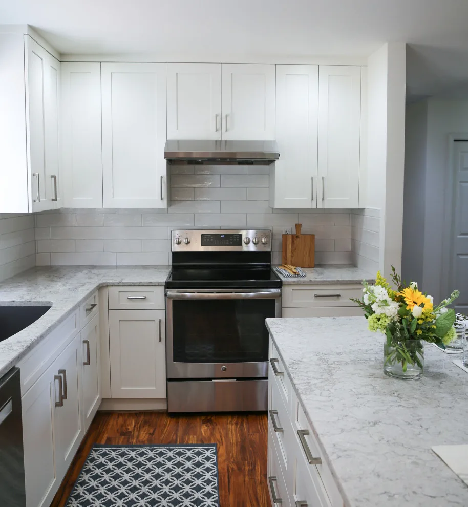 Light-colored Shaker Kitchen by Signature Design & Cabinetry LLC - Photo 10