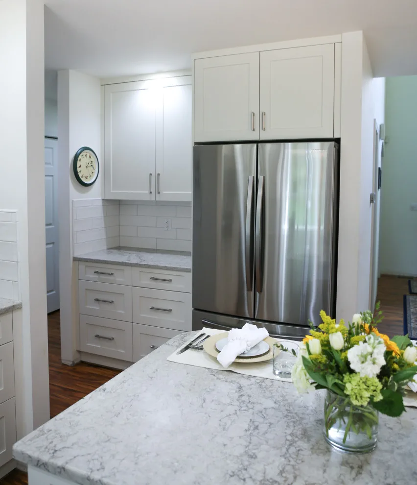 Light-colored Shaker Kitchen by Signature Design & Cabinetry LLC - Photo 9