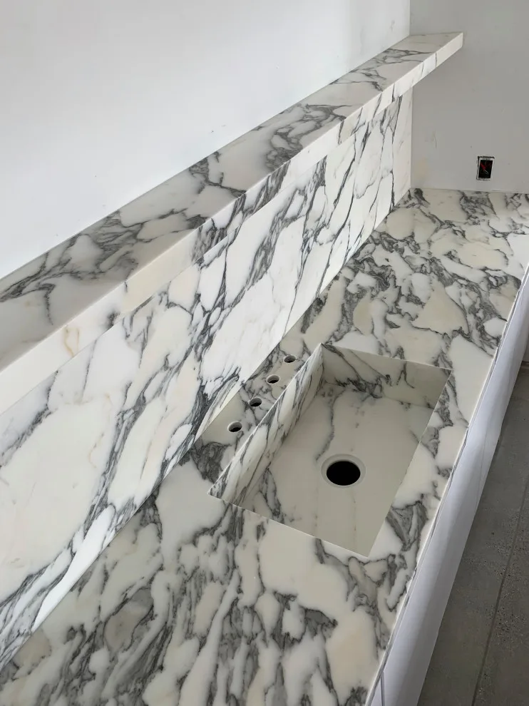 Bespoke marble countertop with integrated sink and complete backsplash for office by CMG Granite And Stone Inc. - Photo 3