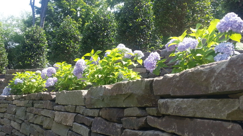 Retaining wall with fire pit seat wall by Bruno Design Associates - Photo 3